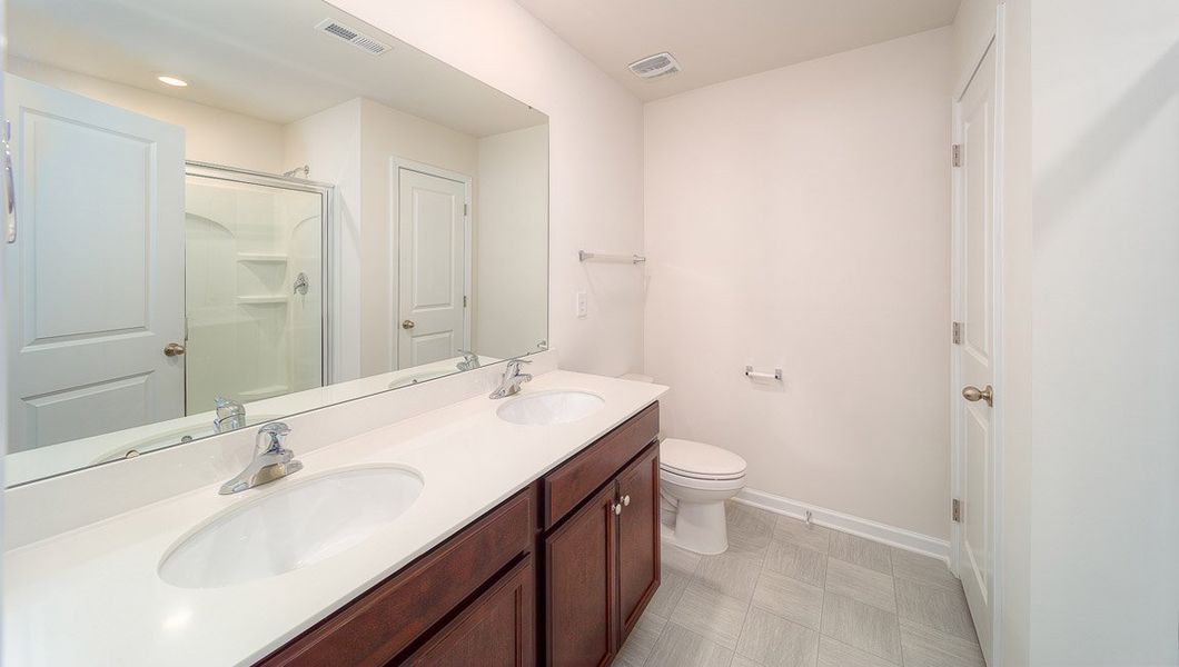 Representative furnished interior of a home built from the Harrison by D.R. Horton in Brookside Farms - The Meadows, Greer (Image 12).