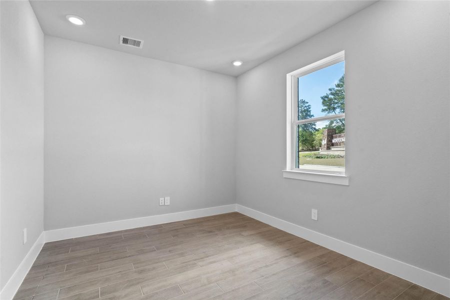 This dedicated laundry room comes equipped with a washer and dryer set, ready for immediate use. This dedicated laundry room comes equipped with a washer and dryer set, ready for immediate use.