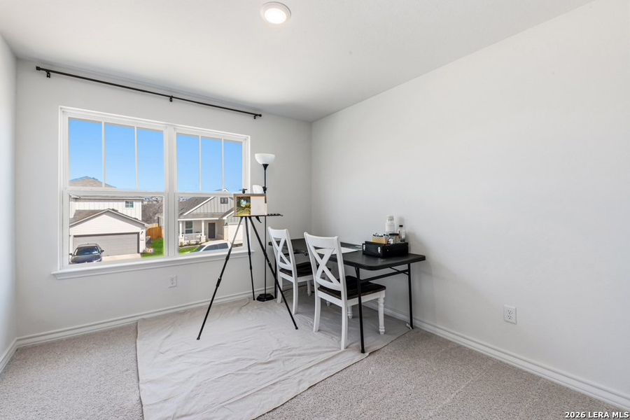 Furnished interior view inside a new home in Cinco Lakes, San Antonio (Image 8).