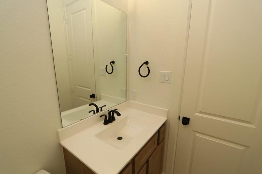 Furnished interior view inside a new home in Harvest Green 45', Richmond (Image 5).