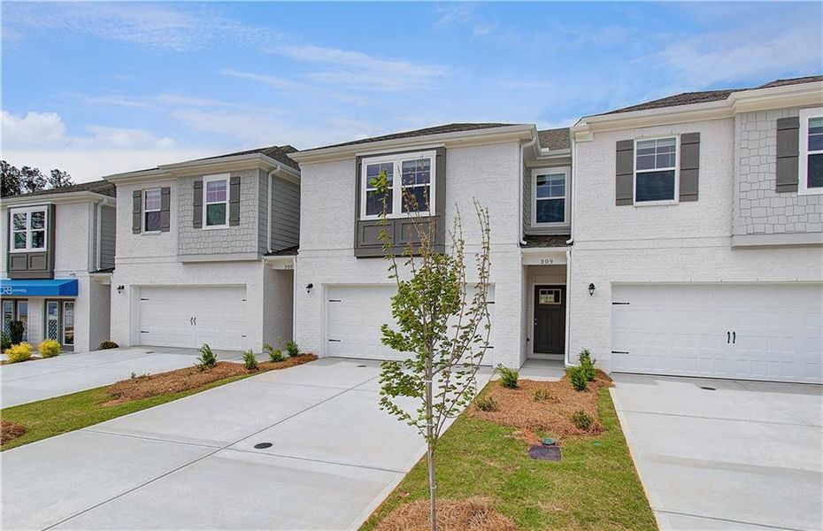 Front exterior of a new home in Bowers Farm, McDonough, GA, highlighting curb appeal (Image 17).