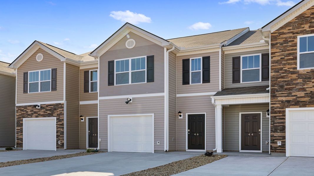 Front exterior of a new home in Brookside Ridge Townhomes, Greer, SC, highlighting curb appeal (Image 2).