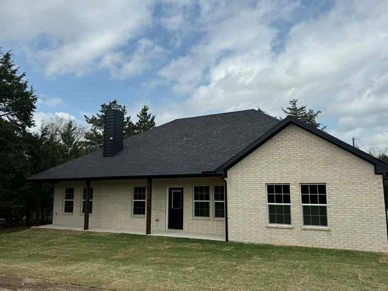 Exterior details and patio area of a home in , Ector (Image 3).