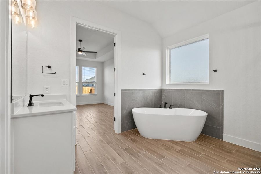 Furnished interior view inside a new home in Village at Three Oaks, Seguin (Image 7).