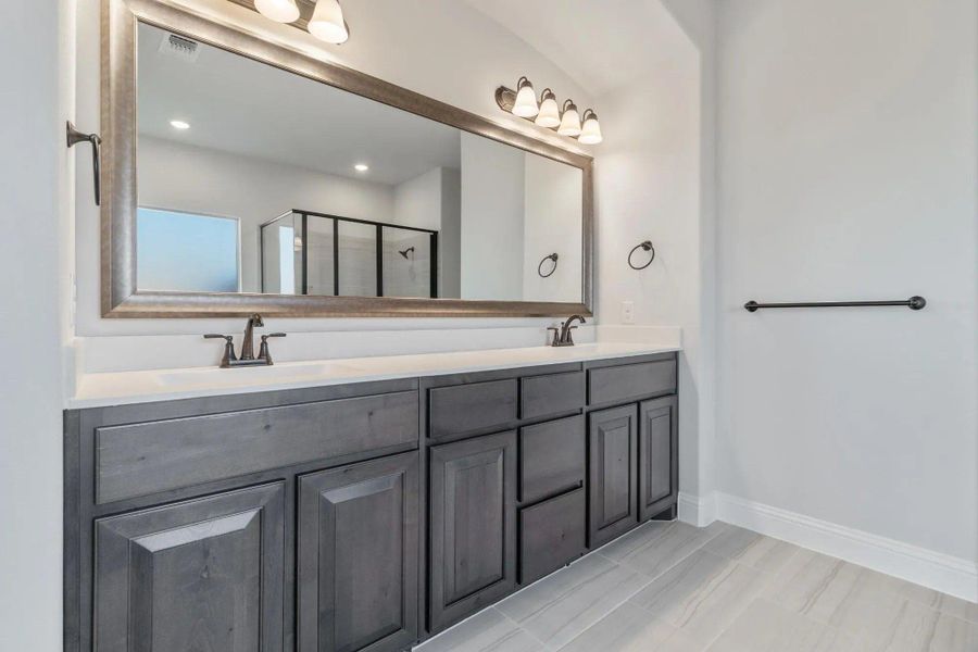 Primary Bathroom | Concept 2373 at Coyote Crossing in Godley, TX by Landsea Homes Primary Bathroom | Concept 2373 at Coyote Crossing in Godley, TX by Landsea Homes