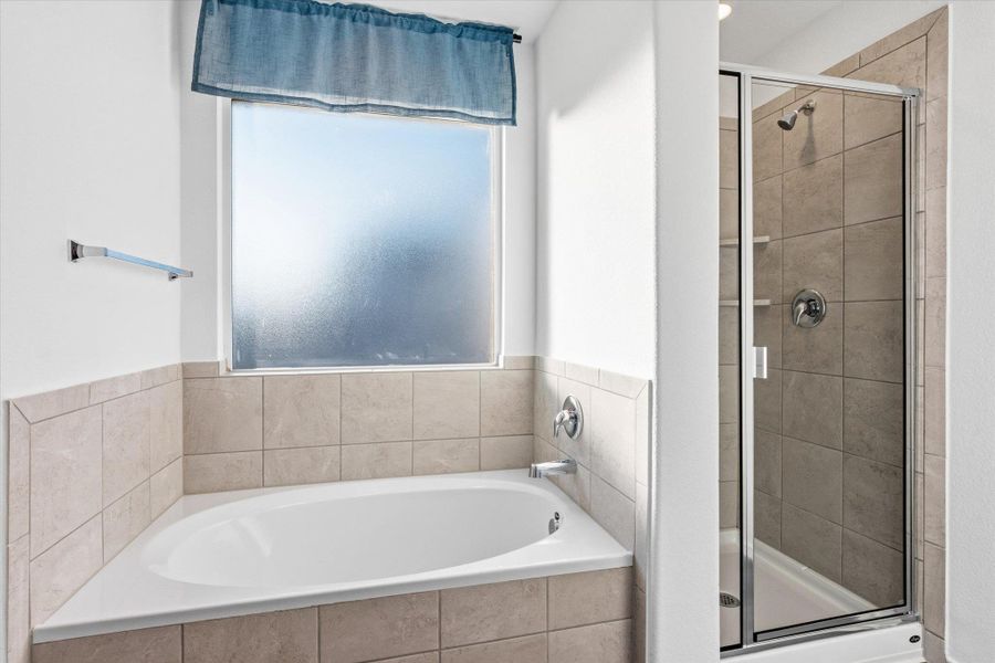 Furnished interior view inside a new home in Thunder Rock: Watermill Collection, Marble Falls (Image 8).