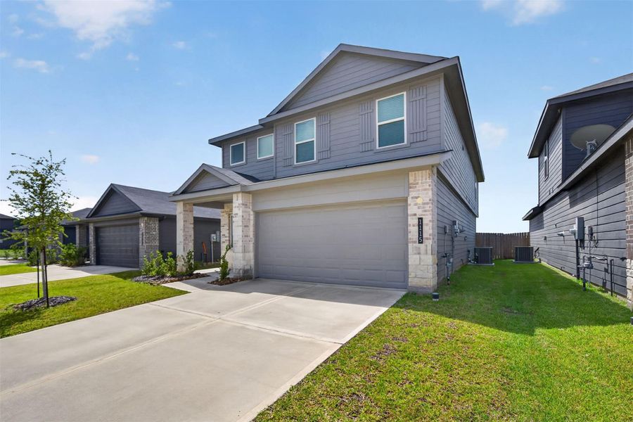 Front exterior of a new home in , Houston, TX, highlighting curb appeal (Image 25).