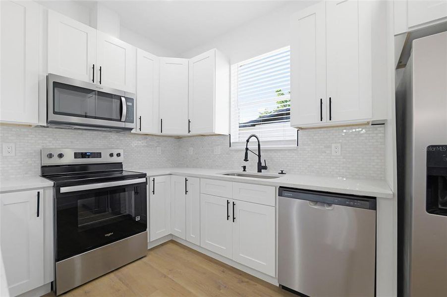 Furnished interior view inside a new home in , Dade City (Image 9).