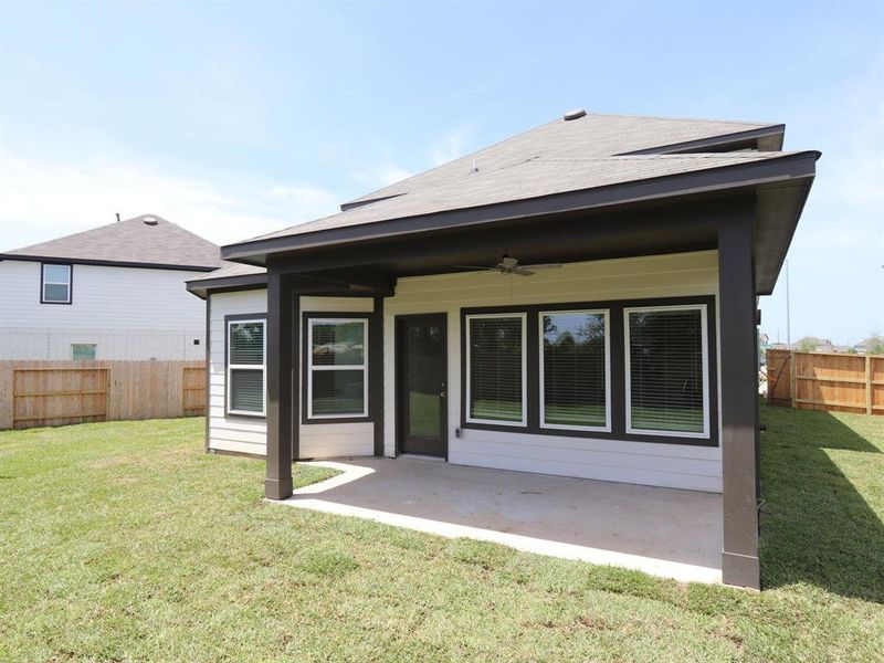 Front exterior of a new home in Summerview, Fulshear, TX, highlighting curb appeal (Image 17). Front exterior of a new home in Summerview, Fulshear, TX, highlighting curb appeal (Image 17).