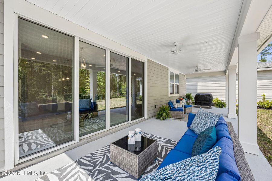 Exterior details and patio area of a home in Tributary, Yulee (Image 23).