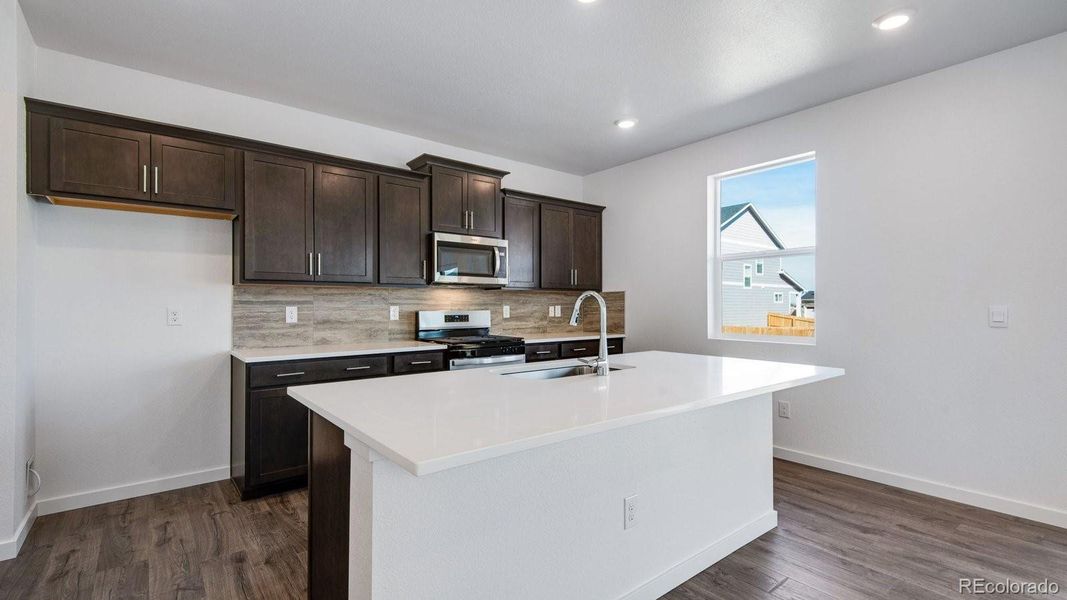 Furnished interior view inside a new home in Sky Ranch, Watkins (Image 11).