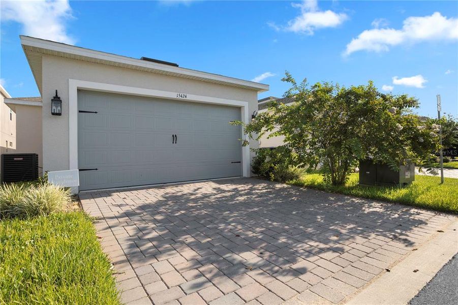Front exterior of a new home in , Winter Garden, FL, highlighting curb appeal (Image 23).