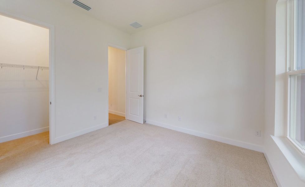 Spacious, unfurnished interior of a new home in Woodhaven, Port Orange (Image 34).