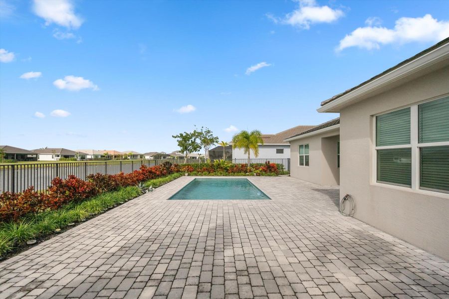 Exterior details and patio area of a home in , The Acreage (Image 4).