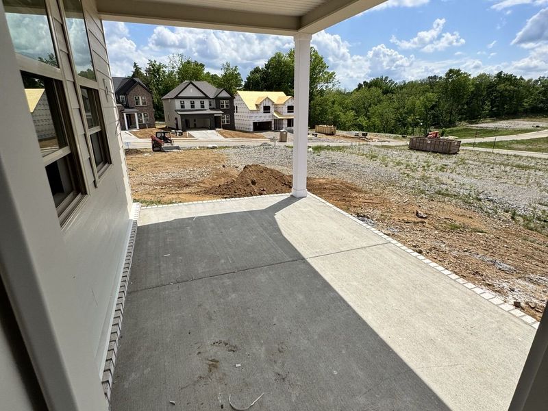 Exterior details and patio area of a home in Woods Crossing, Gallatin (Image 3).
