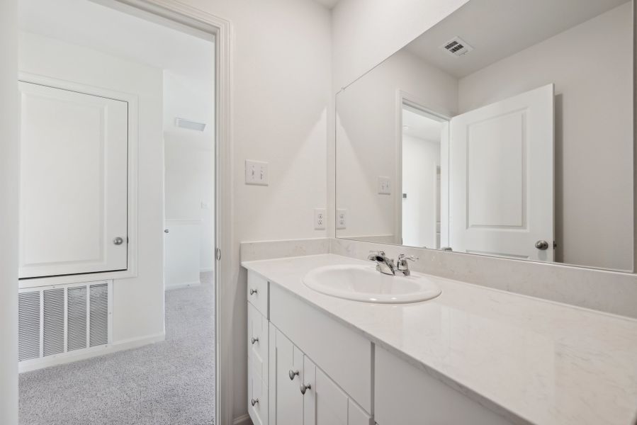 Representative furnished interior of a home built from the Voyager by Starlight Homes in Stonebrooke, Conroe (Image 12).