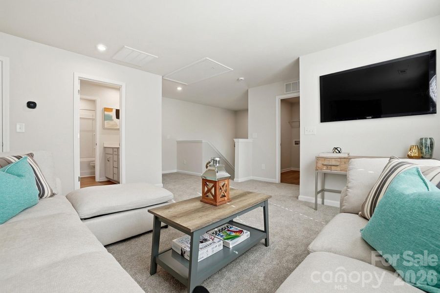 Furnished interior view inside a new home in Waxhaw Landing, Monroe (Image 16).
