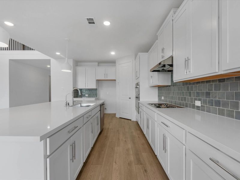 Kitchen. Sample product photo. Actual exterior and interior selections may vary by homesite. Photo may be virtually staged. Kitchen. Sample product photo. Actual exterior and interior selections may vary by homesite. Photo may be virtually staged.