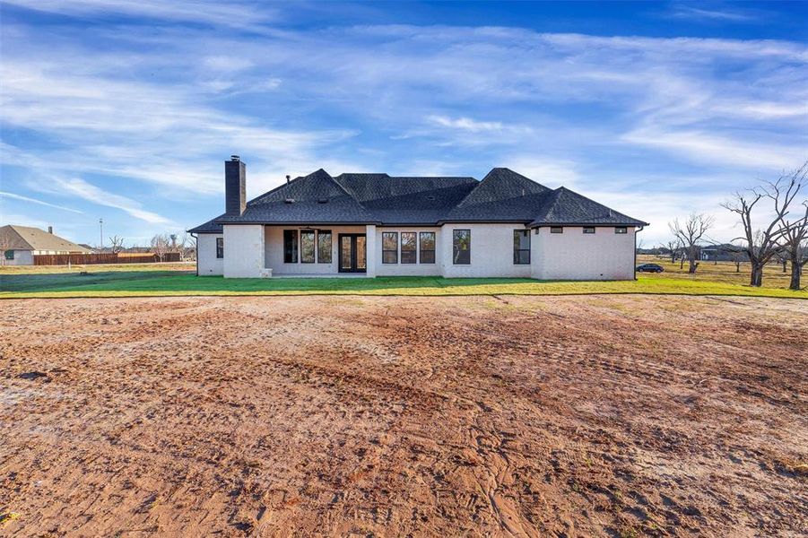 Exterior details and patio area of a home in , Granbury (Image 27).