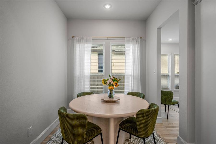 Start your day off right with a cup of coffee sitting with your family in the breakfast area! Featuring large windows, neutral paint, beautiful flooring, recessed lighting, high ceilings and access to the game room!