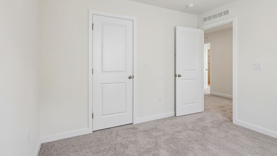Furnished interior view inside a new home in Cyrene at Harmony, St. Cloud (Image 17). Furnished interior view inside a new home in Cyrene at Harmony, St. Cloud (Image 17).