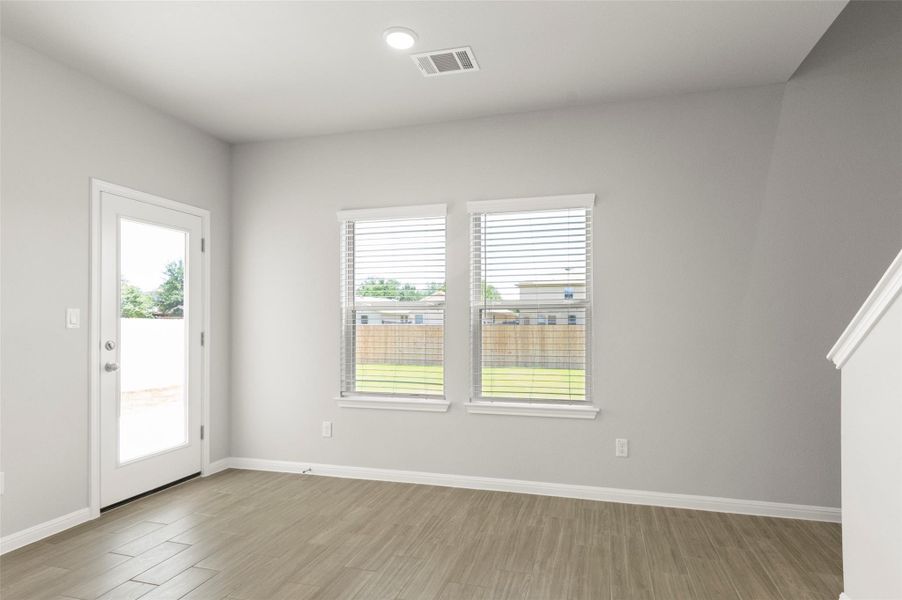 Empty room featuring light wood-style floors and baseboards