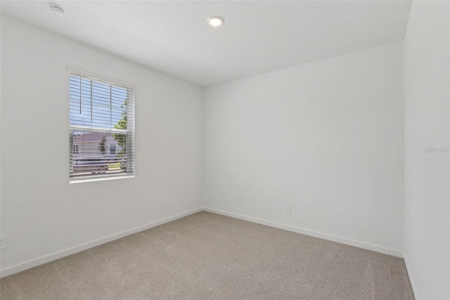 Spacious, unfurnished interior of a new home in Colbert Landings, Palm Coast (Image 21).
