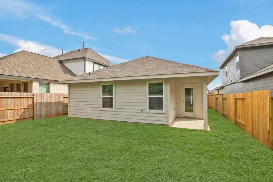 Exterior details and patio area of a home in Venetian Pines, Conroe (Image 3). Exterior details and patio area of a home in Venetian Pines, Conroe (Image 3).