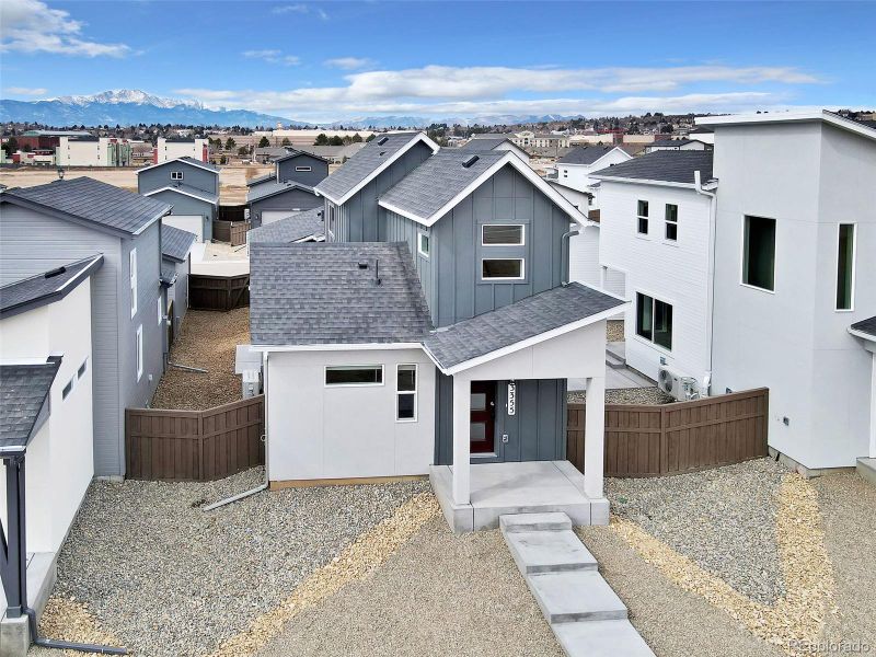 Front exterior of a new home in , Colorado Springs, CO, highlighting curb appeal (Image 20). Front exterior of a new home in , Colorado Springs, CO, highlighting curb appeal (Image 20).