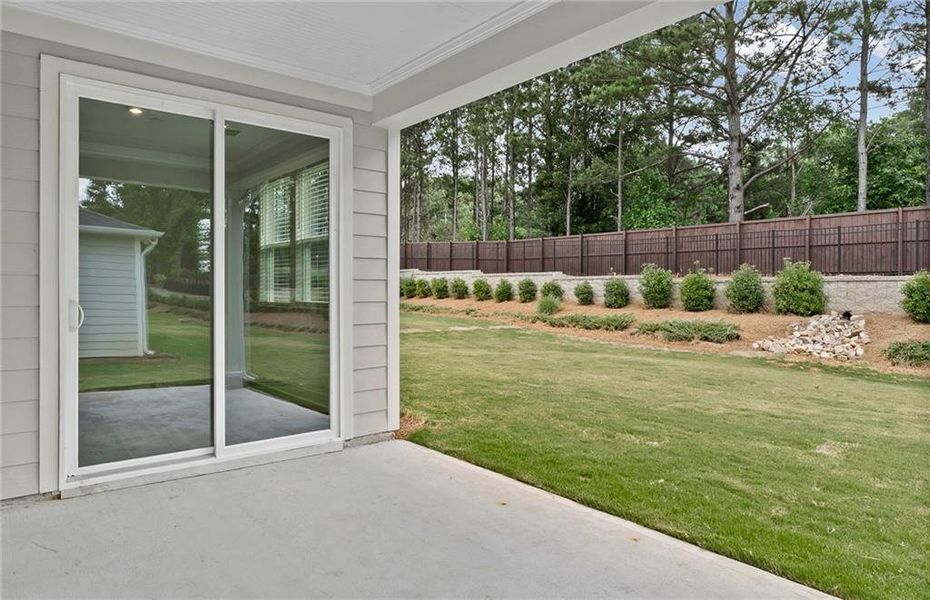 Exterior details and patio area of a home in Sun City Peachtree, Griffin (Image 3).