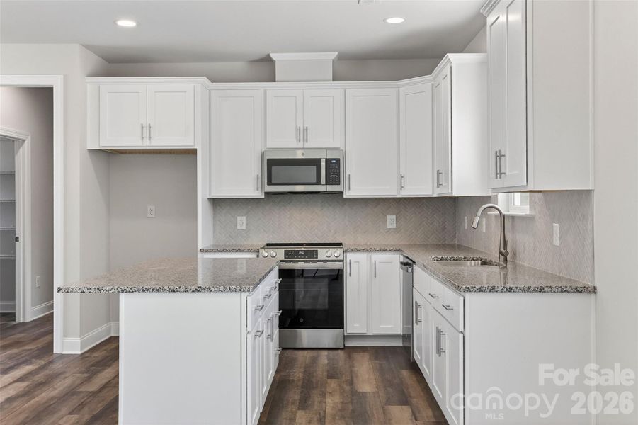 Furnished interior view inside a new home in , Statesville (Image 10).