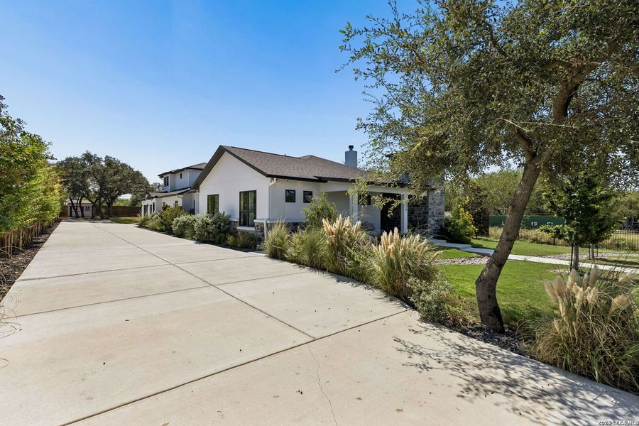 Front exterior of a new home in , Leon Valley, TX, highlighting curb appeal (Image 27).