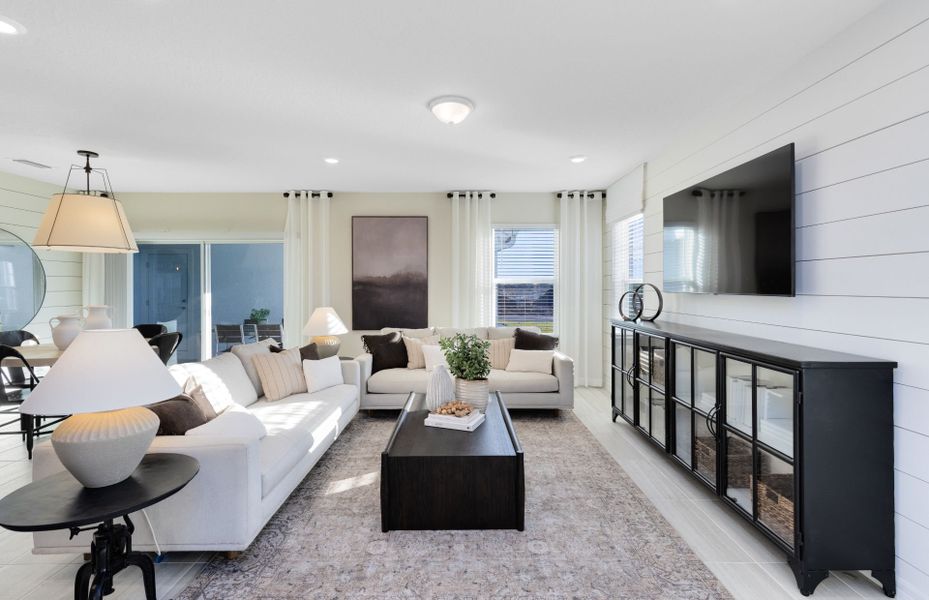 Representative furnished interior of a home built from the Mabel II by Pulte Homes in EverBe, Orlando (Image 10).