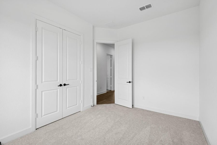 Spacious, unfurnished interior of a new home in Riceland - Enclave Row Collection, Mont Belvieu (Image 23).