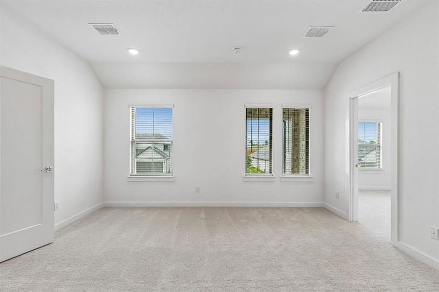 Media Room in the Claret home plan by Trophy Signature Homes – REPRESENTATIVE PHOTO