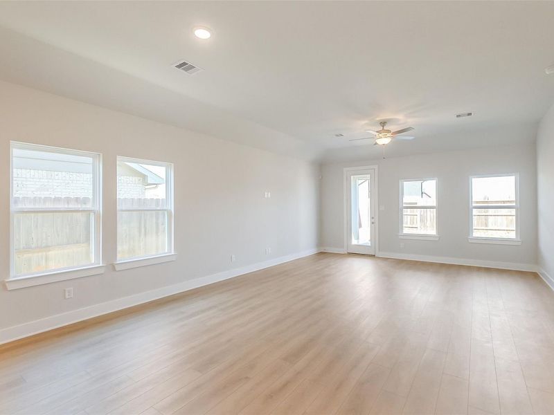 Spacious, unfurnished interior of a new home in Sunterra, Katy (Image 23).