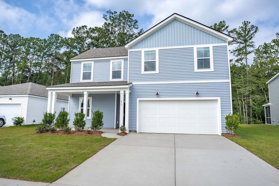 Front exterior of a new home in Bradford Pointe, Summerville, SC, highlighting curb appeal (Image 18).