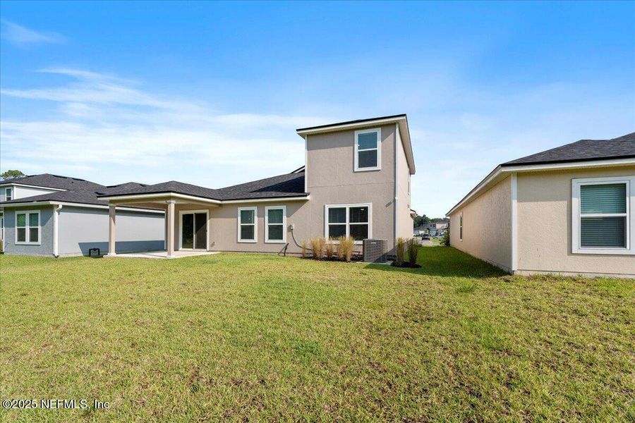 Exterior details and patio area of a home in Dunns Crossing, Jacksonville (Image 30). Exterior details and patio area of a home in Dunns Crossing, Jacksonville (Image 30).