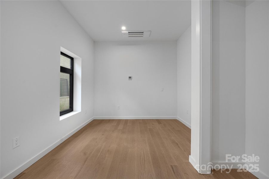 Lower-level guest apartment bedroom.