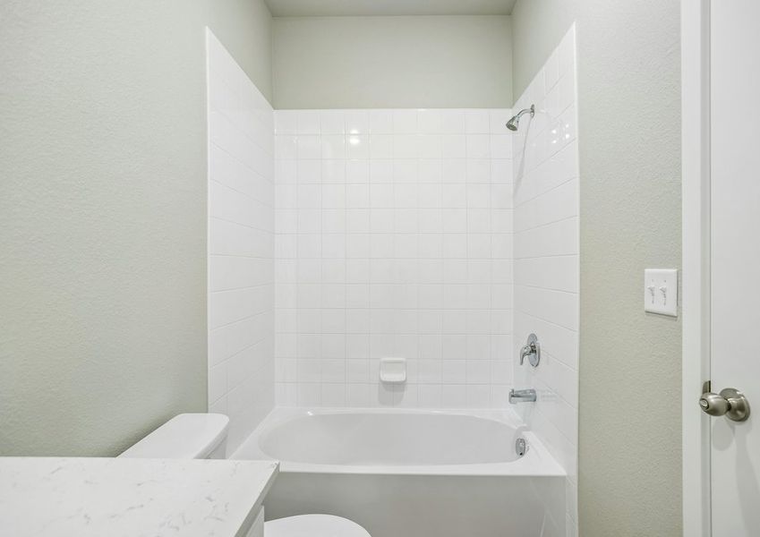 The secondary bathroom has a tub/shower combo.