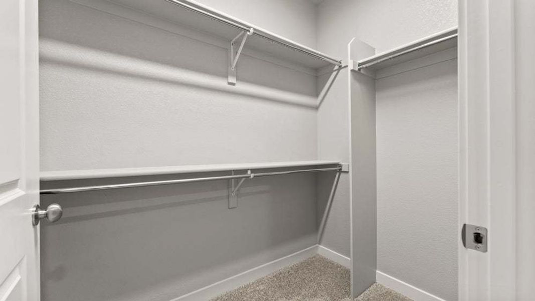 Primary Closet - Not Actual Home - Finishes May Vary