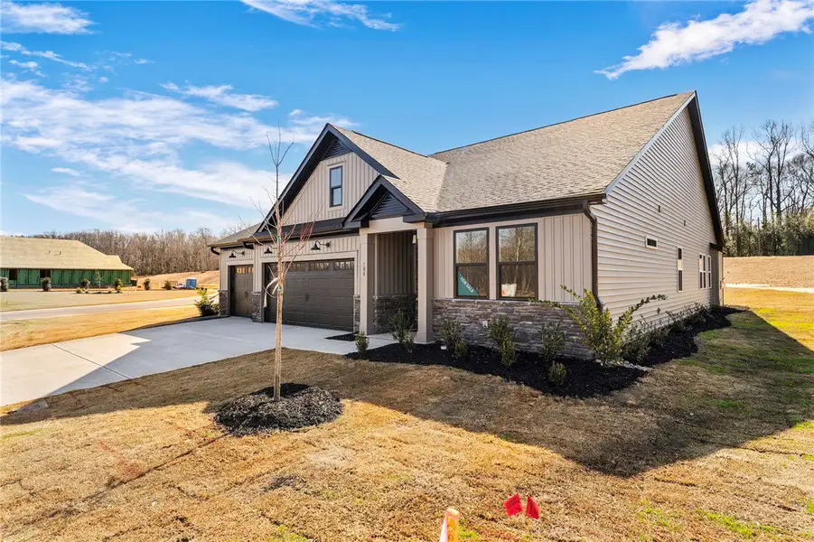 This newly constructed home boasts modern design a This newly constructed home boasts modern design a
