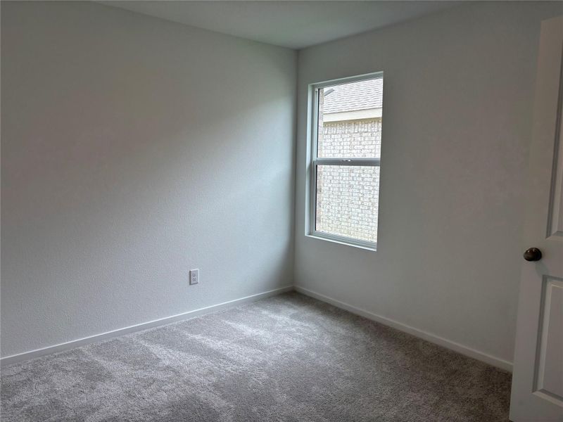 Spacious, unfurnished interior of a new home in Binford Creek, Waller (Image 27).