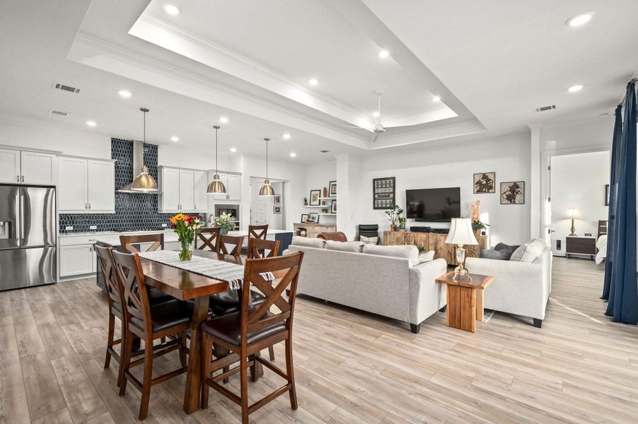 An inviting open floor plan offers seamless flow and plentiful natural light throughout An inviting open floor plan offers seamless flow and plentiful natural light throughout
