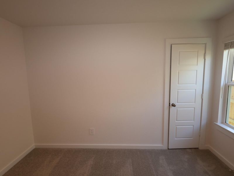 Spacious, unfurnished interior of a new home in Pinewood at Grand Texas, New Caney (Image 6).