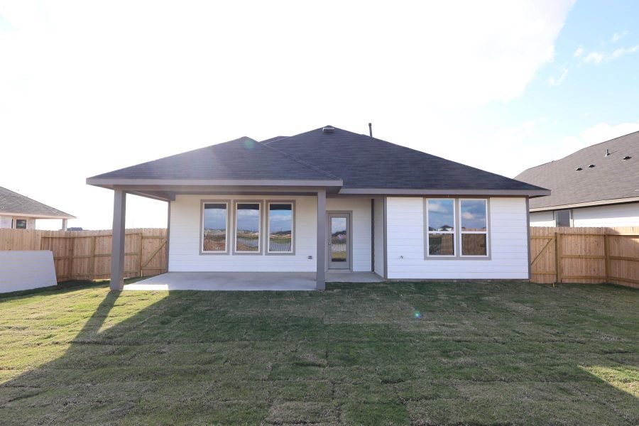 Exterior details and patio area of a home in The Timbers at Mason Woods, Cypress (Image 3).
