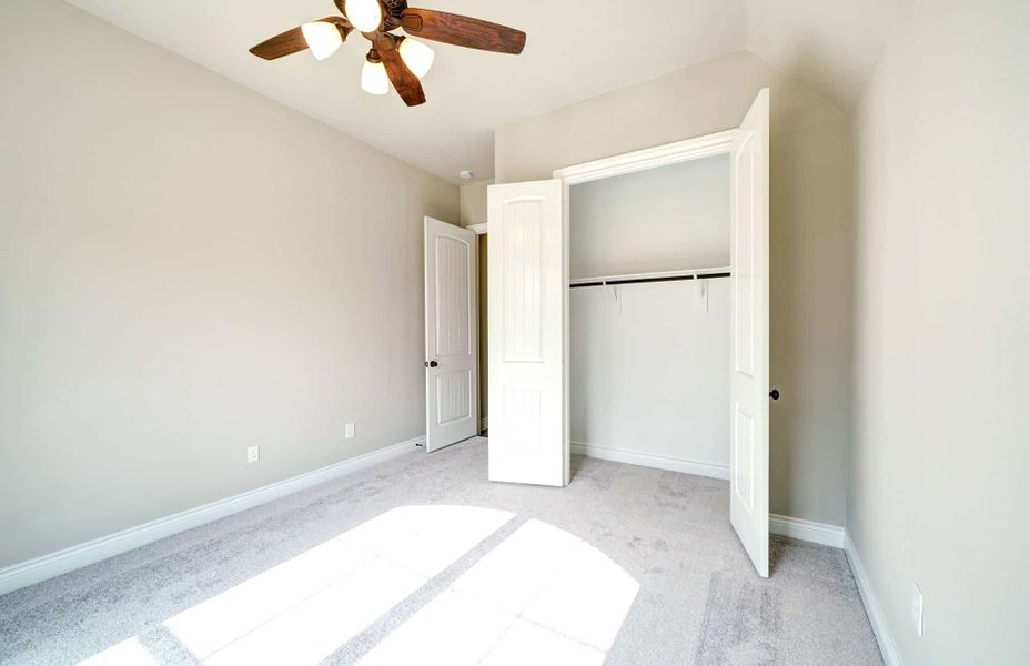 Representative unfurnished interior of a home built from the 3030 by Ravenna Homes in The Woodlands Hills 65′, Willis (Image 41). Representative unfurnished interior of a home built from the 3030 by Ravenna Homes in The Woodlands Hills 65′, Willis (Image 41).