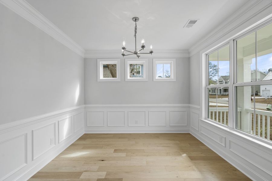 Spacious, unfurnished interior of a new home in K. Hovnanian's® Four Seasons at Lakes of Cane Bay, Summerville (Image 10).