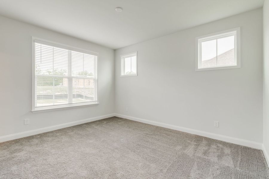 Spacious, unfurnished interior of a new home in Pecan Orchard, Elgin (Image 23).