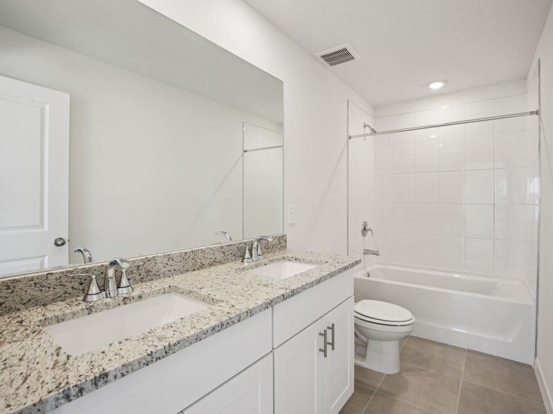 Furnished interior view inside a new home in Oakfield Trails - Premier Series, Parrish (Image 11).